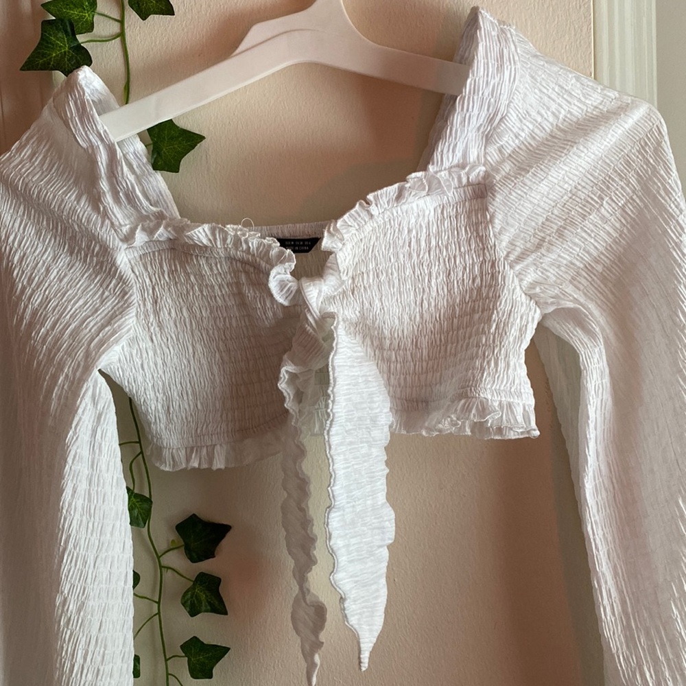 White ruffle long sleeve blouse